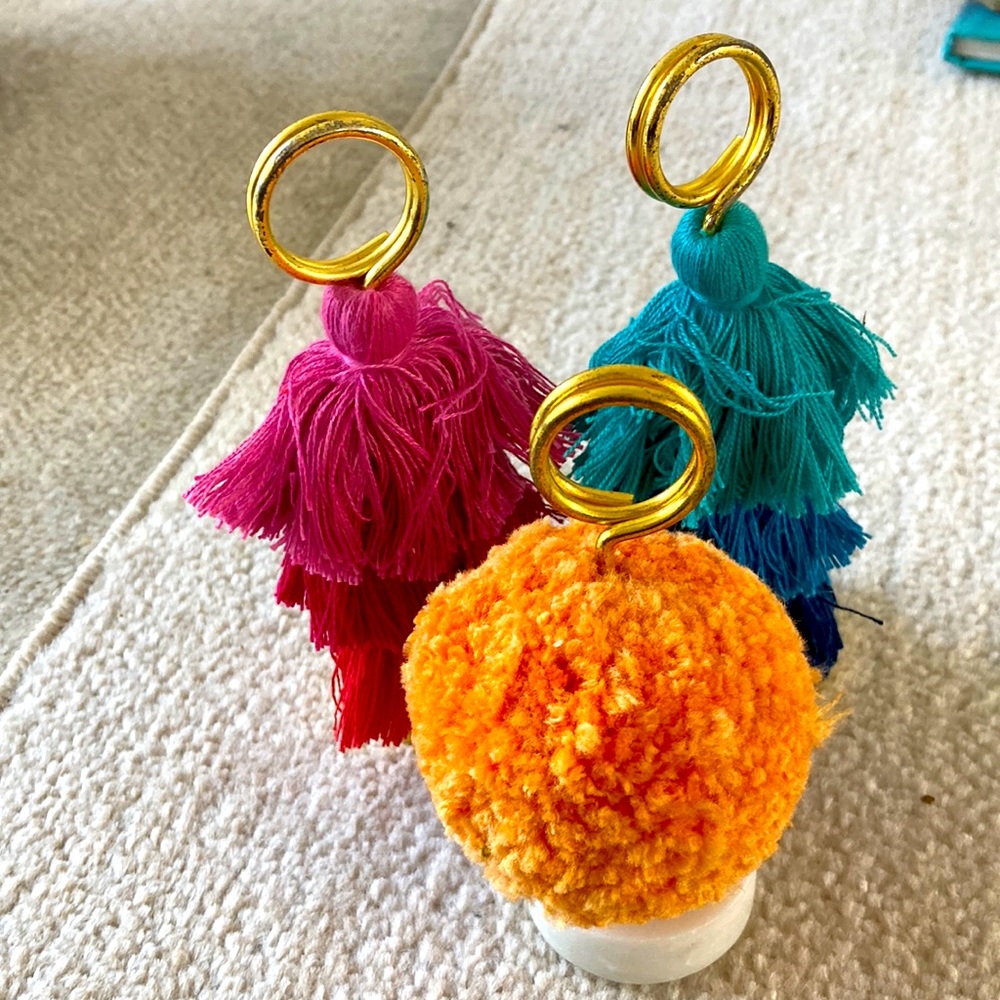 Three tassel sign photo  or card holders. Vibrant tropical cotton with gold loop